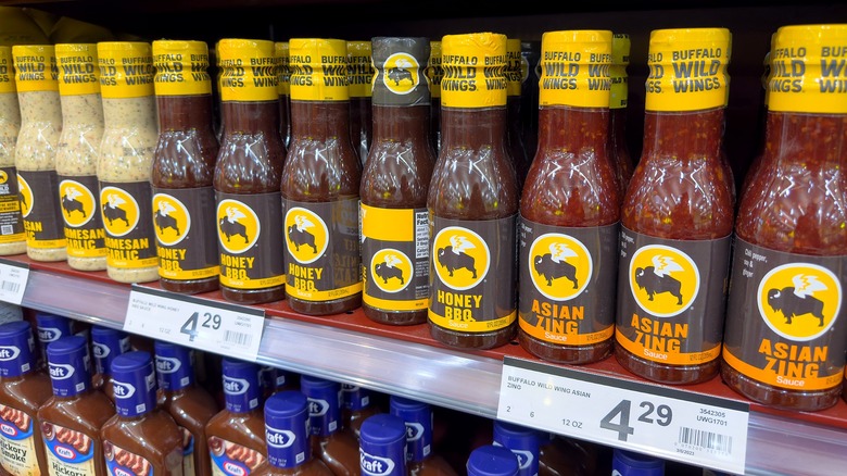 Buffalo Wild Wings sauces on a grocery store shelf