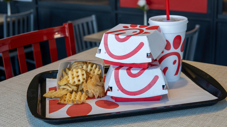 some fast food items on a table inside a Chick-fil-A