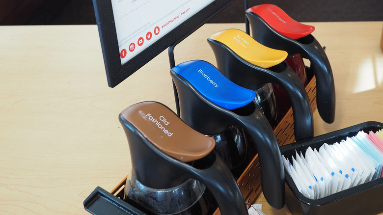 IHOP syrup bottles on a table