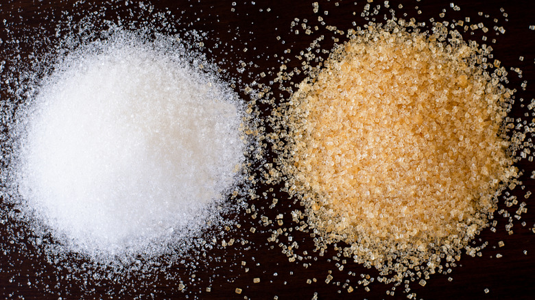 Close up of white sugar and turbinado sugar