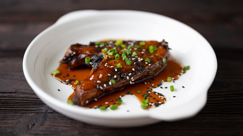 miso marinated fish on white plate