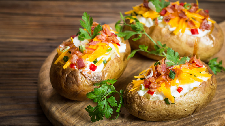 baked potatoes with cheese and bacon