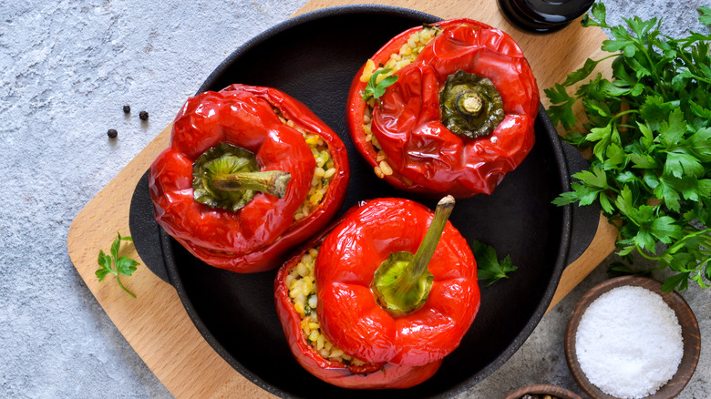 stuffed peppers on black plate