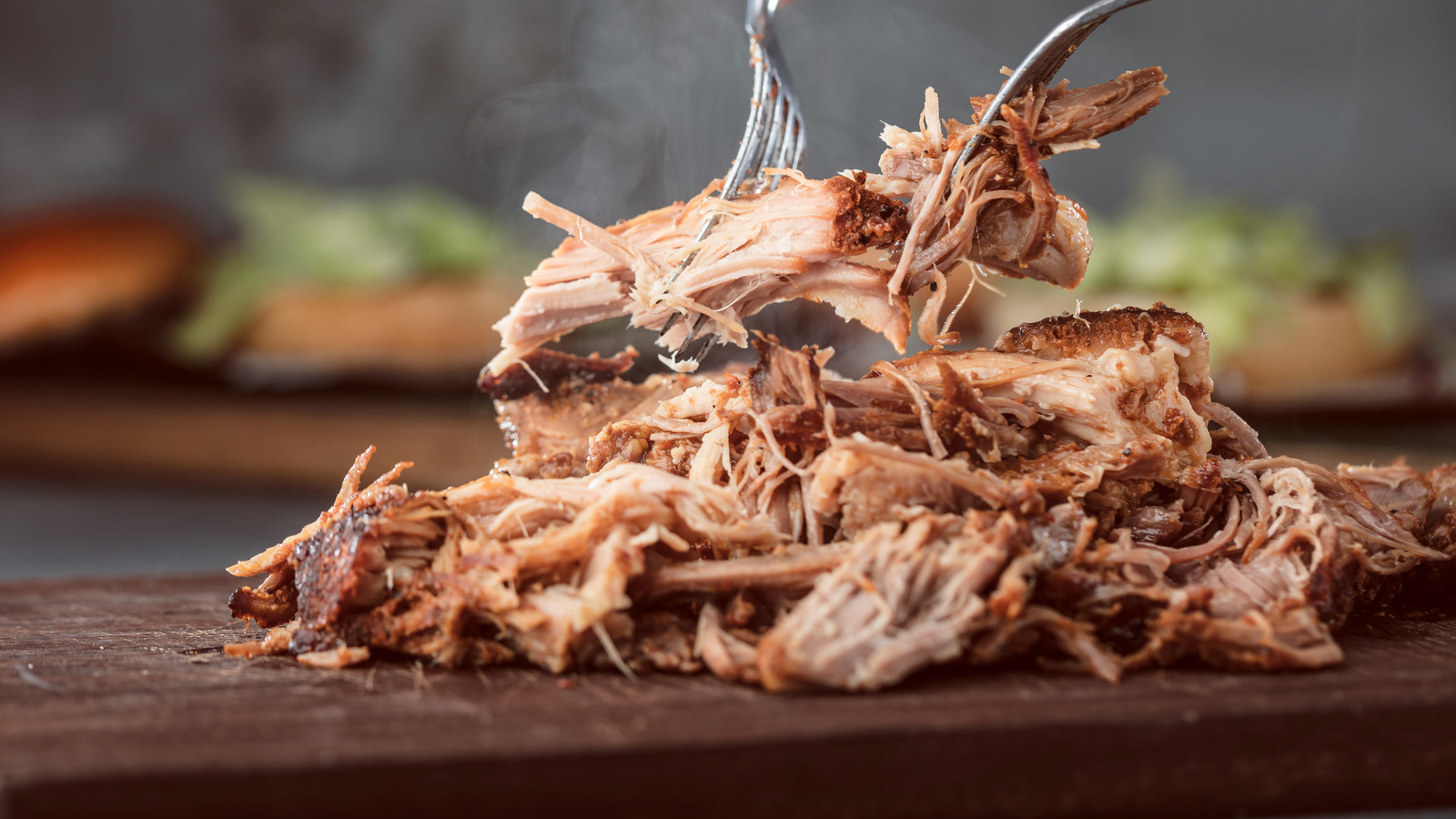 https://www.thedailymeal.com/img/gallery/what-to-do-with-leftover-pulled-pork/l-intro-1671221851.jpg