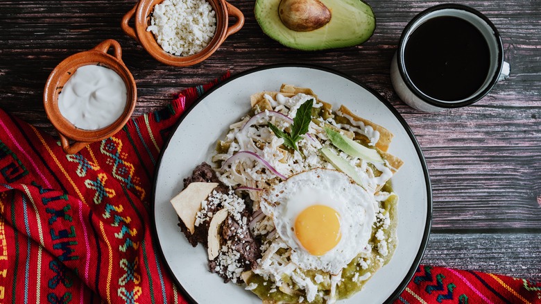 Mexican chilaquiles with egg and chicken