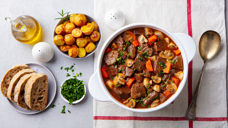 Beef stew with potatoes and bread