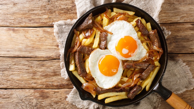 Steak and eggs with potatoes
