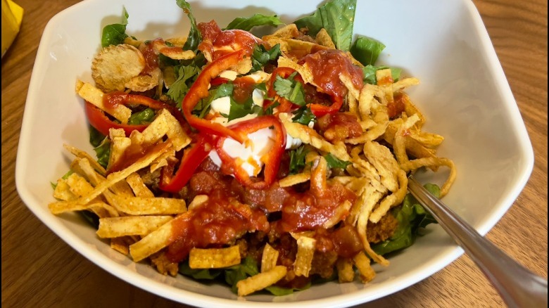 A taco salad in a bowl