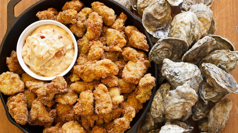 Fried oysters, sauce and shells