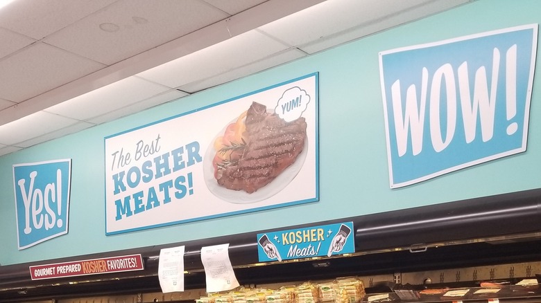 A sign for kosher meats