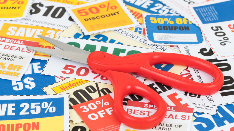 Scissors on top of coupons