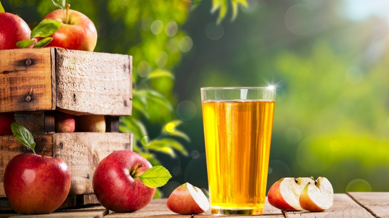 Apples and glass of cider