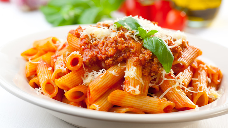 Rigatoni with Bolognese sauce in bowl