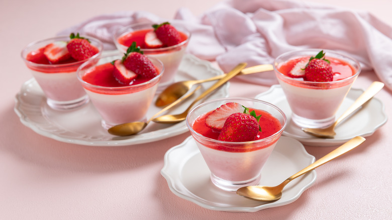 a collection of strawberry mousse cups