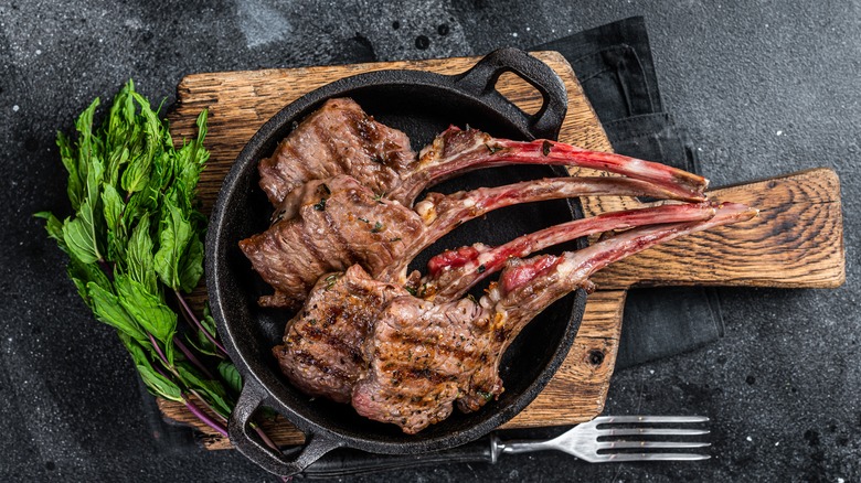 Grilled lamb chops in skillet