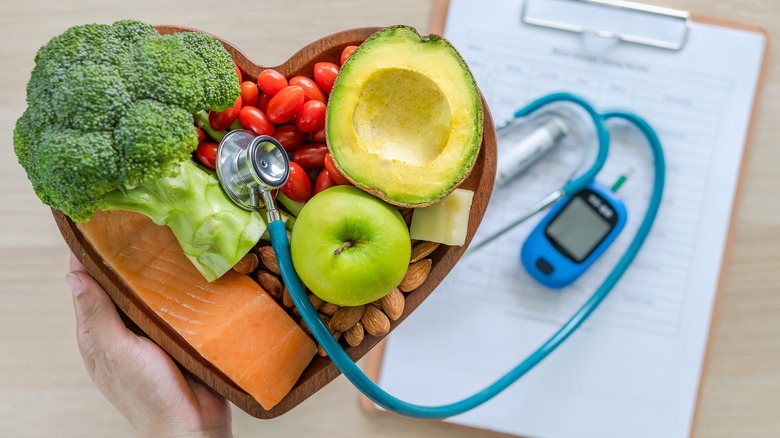 Fruits and vegetables with stethoscope