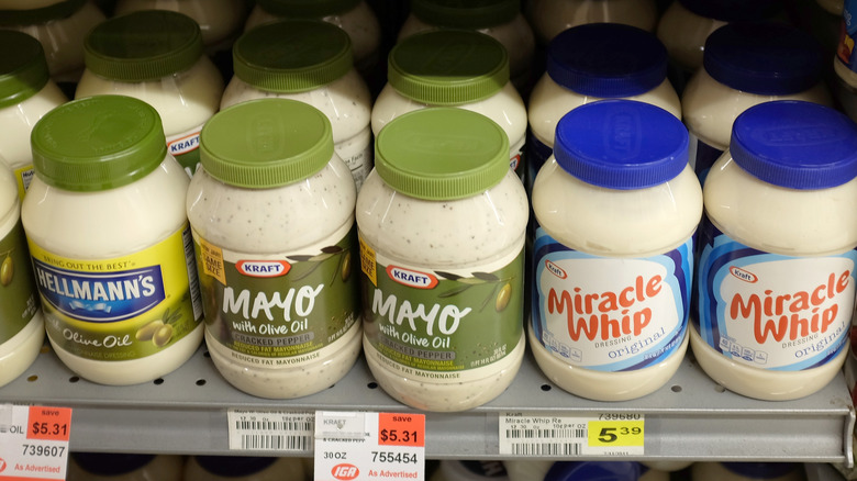 Jars of mayonnaise on shelf