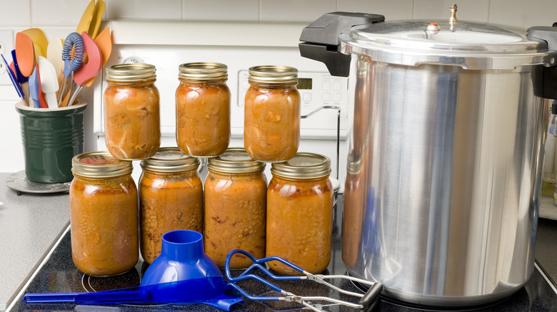 homemade canned soup in jars on stovetop