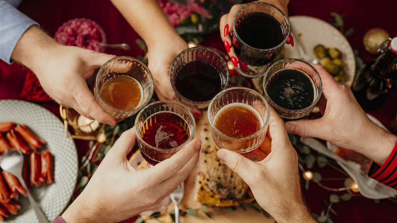 Friends toasting cheers with beer