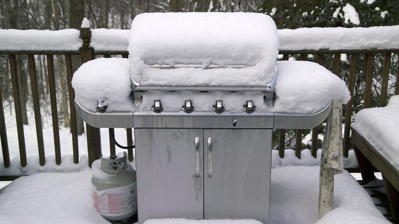 grill covered in snow