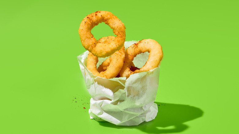 Onion rings in a white bag