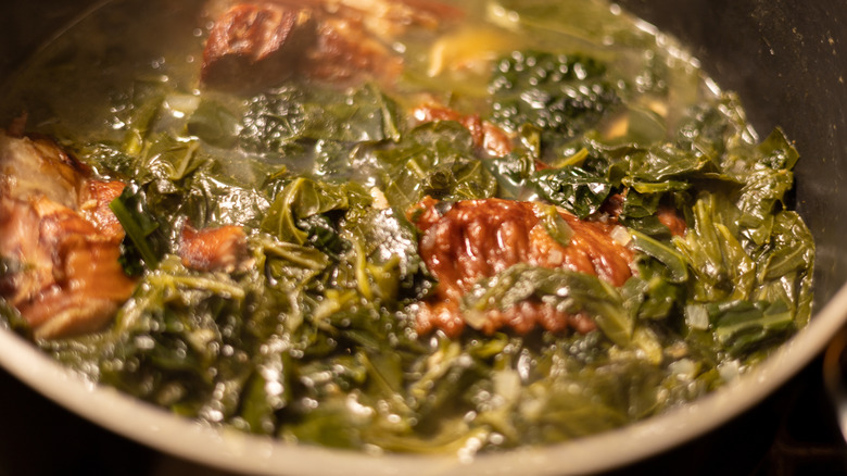 Collard greens cooking in a pot