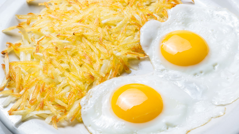 Hash browns with two fried eggs