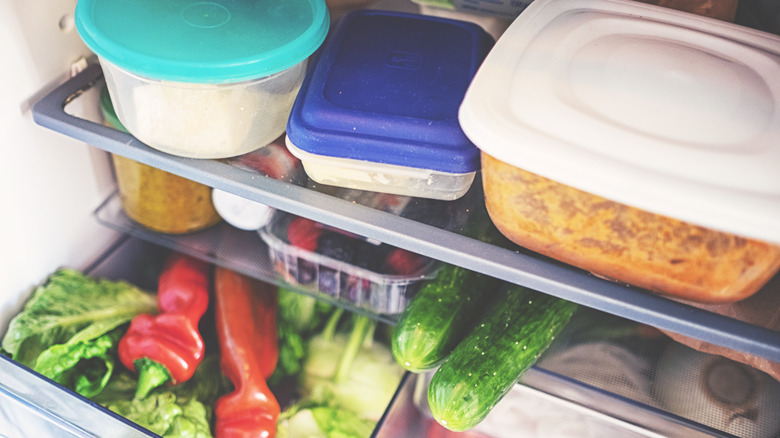 plastic storage containers in refrigerator