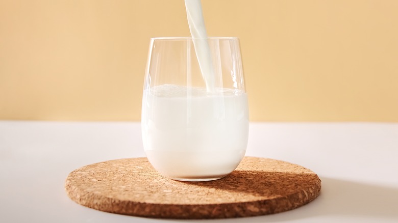 Pouring milk into a glass