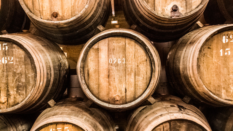 Wooden barrels of whiskey in a row