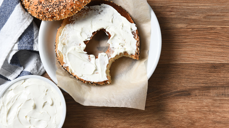 birdseye of a bagel with cream cheese