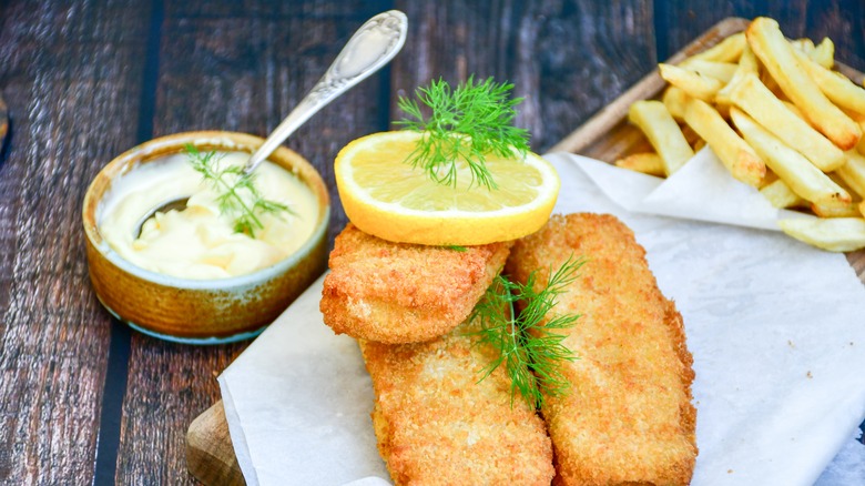 fried fish with a small dish of French remoulade