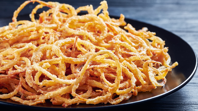 fried onions on plate