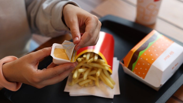 Woman opens McDonald's sauce