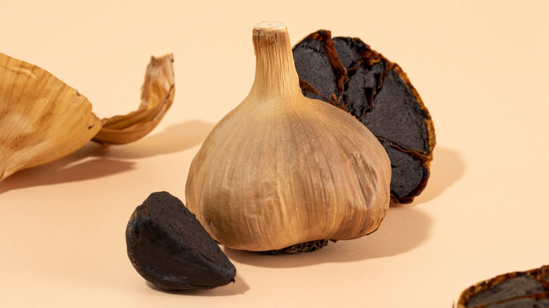 black garlic bulb and clove