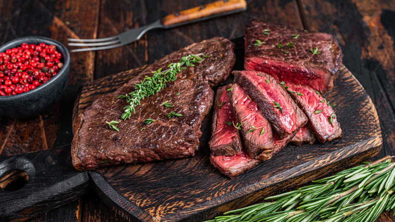 Chopped and seasoned skirt steak on a cutting board