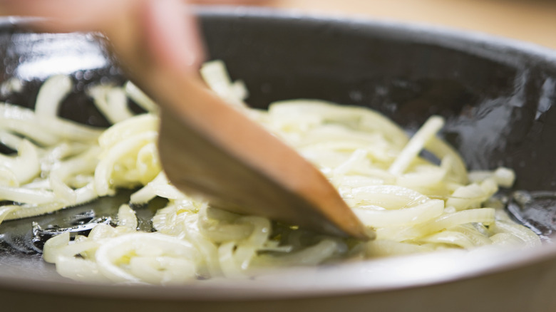 Onions sautéing in pan