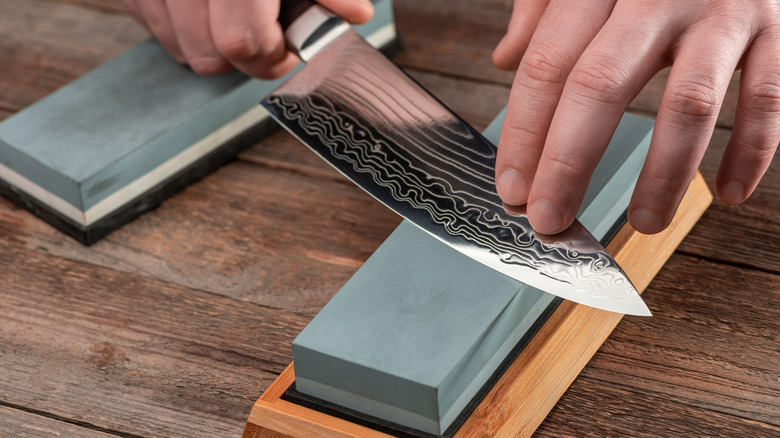 knife sharpening on whetstone