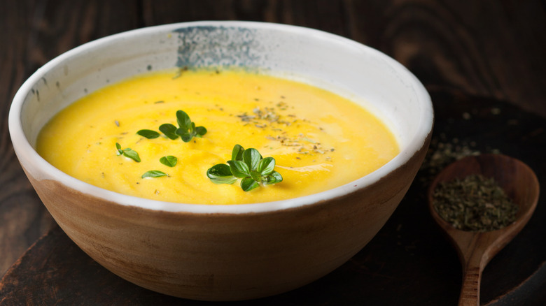 Soup and wooden spoon