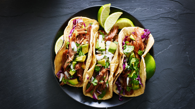 tacos with avocado and cabbage