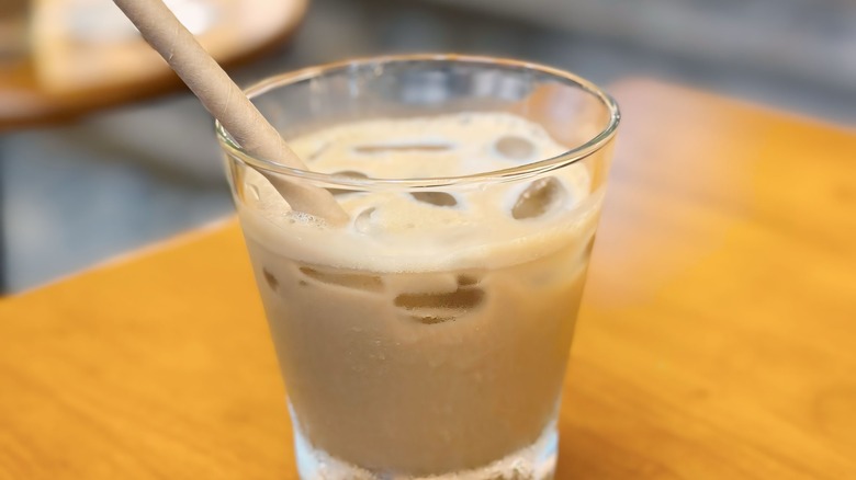 Vietnamese iced coffee with paper straw