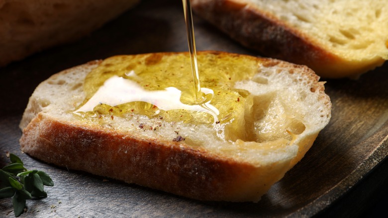 olive oil poured onto bread