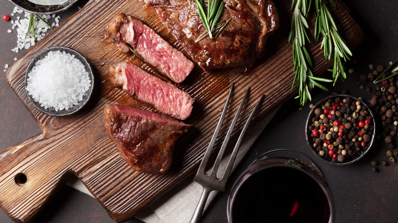 Grilled steak with salt and red wine