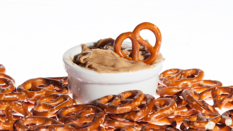 A pretzels dipped in peanut butter