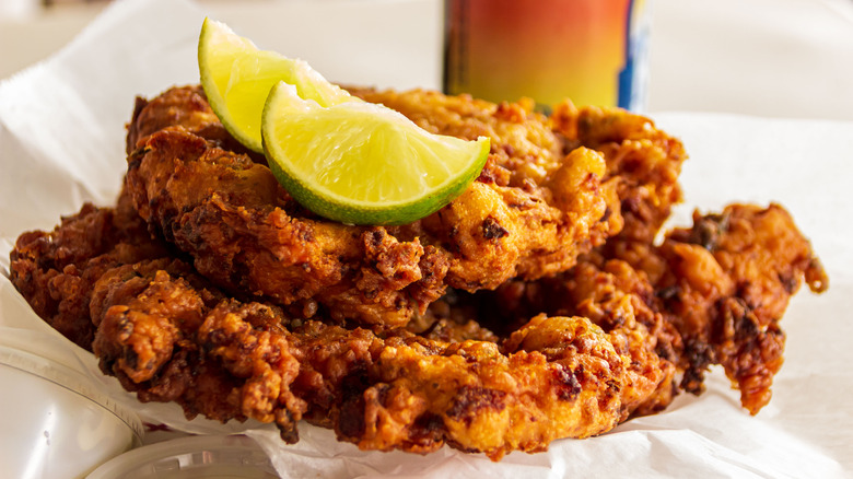 Conch fritters with limes