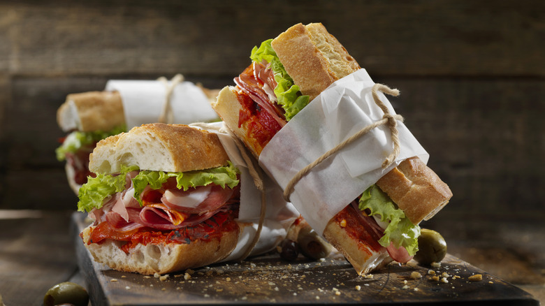 Baguette sandwiches wrapped with parchment and twine