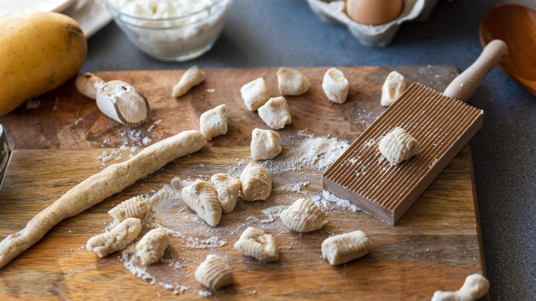 Homemade gnocchi ingredients on cutting board