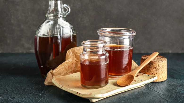 bottle and jars of maple syrup