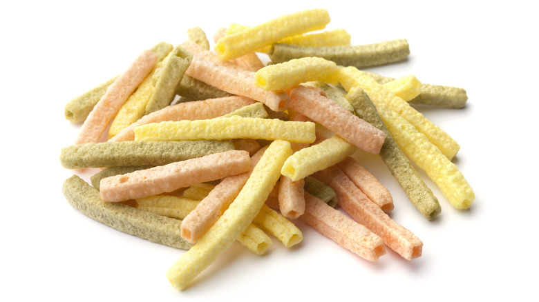 veggie straws on white background