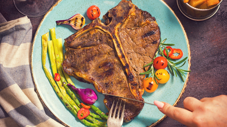 t-bone on plate